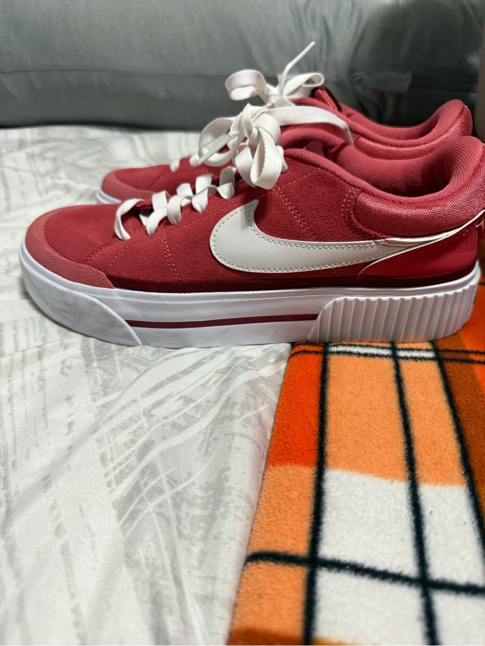 Nike Women’s Rose Pink Suede Sneakers with White Swoosh